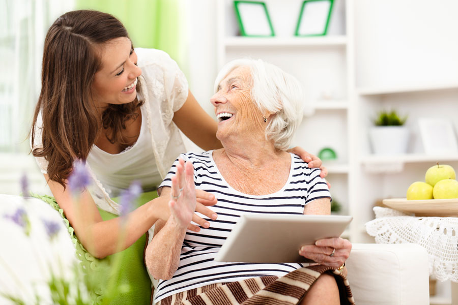 Mother and daughter smiling