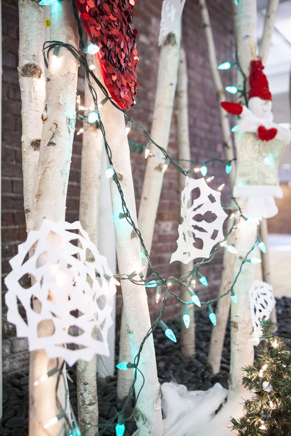 christmas lights and paper snowflakes