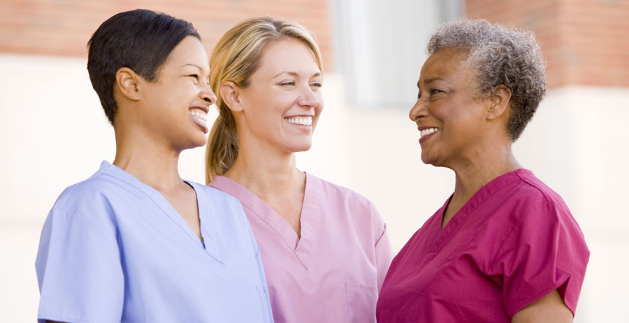 three professional women talking