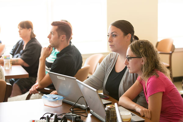 Students in classroom with laptops