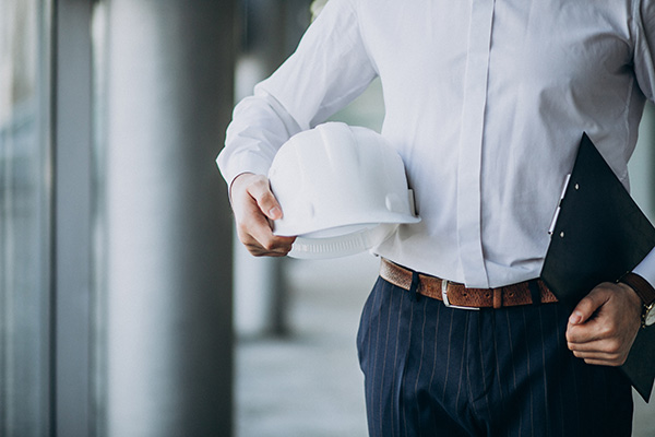 man holding a hard hat
