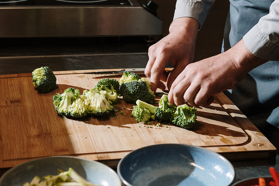 chef chopping up vegetables