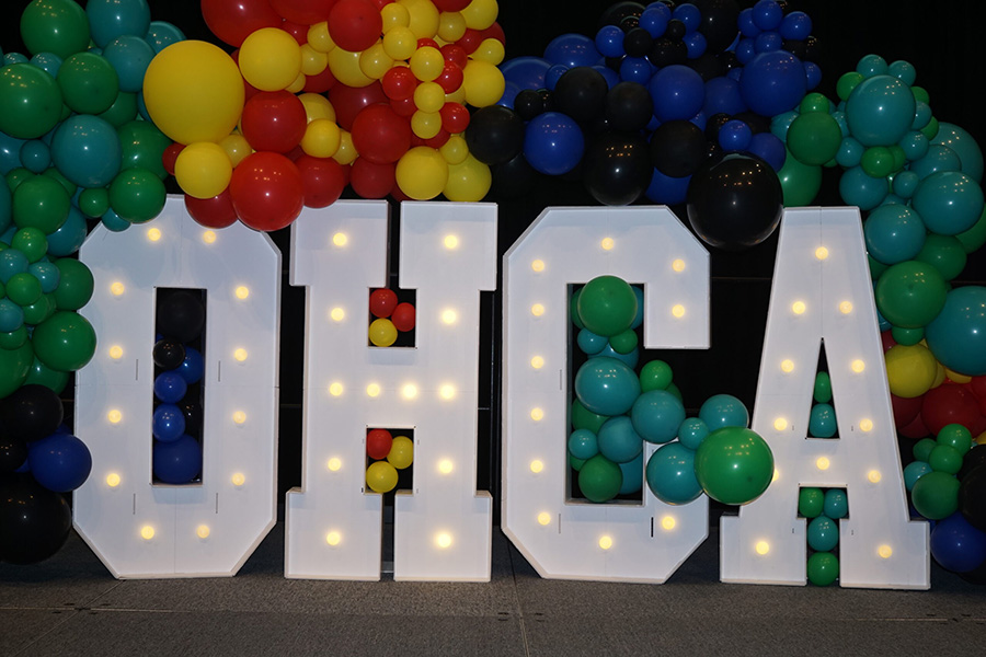 OHCA signage surrounded by balloons